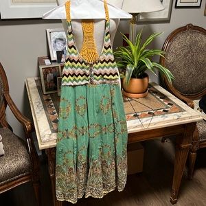 Adorable summer dress by Lulumari size medium. 100% cotton with a side zipper.